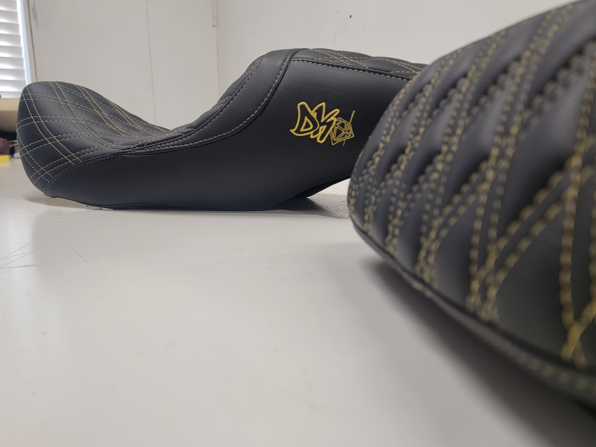 Custom motorcycle seat with DK logo